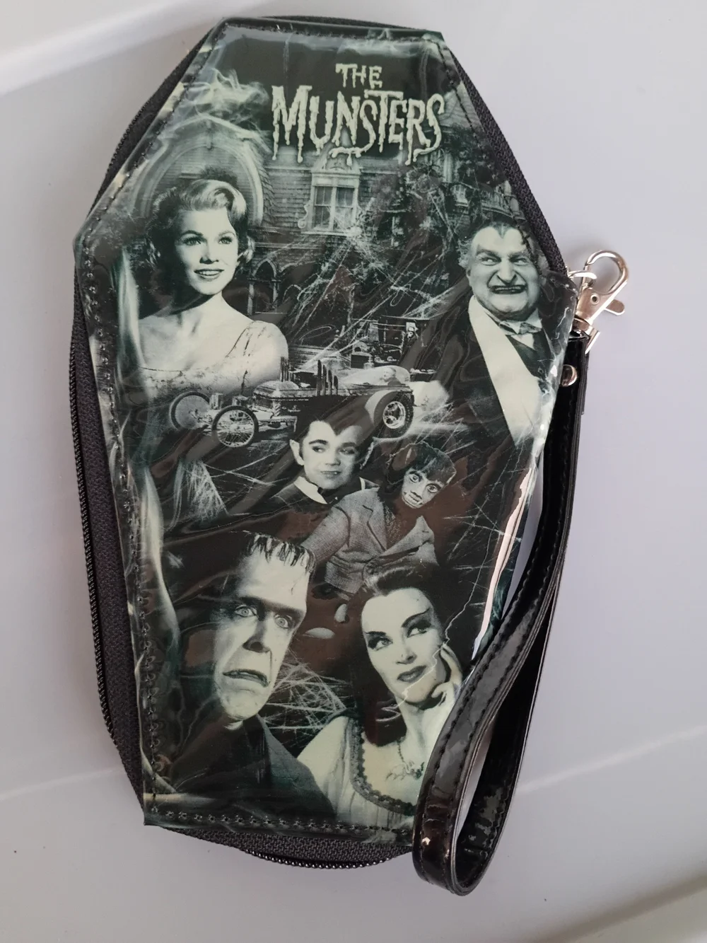 Rock Rebel The Munsters family collage coffin-shaped leather zip-around wallet
